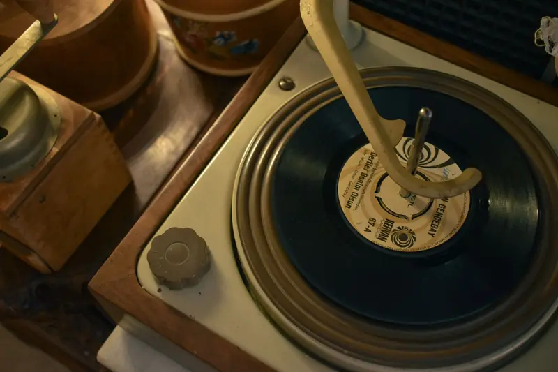 Close-up of a vintage turntable spinning a vinyl record, evoking nostalgia